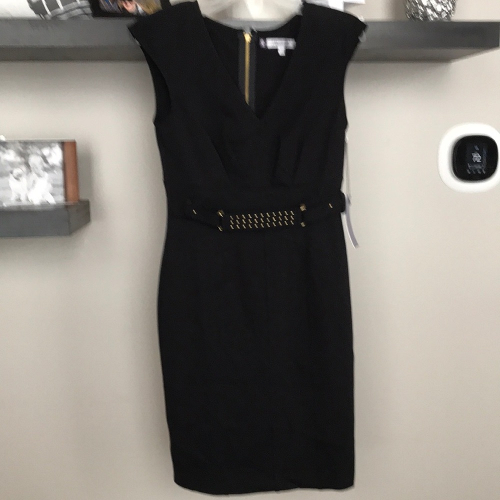 DONATING TOMORROW Jennifer Lopez black gold dress